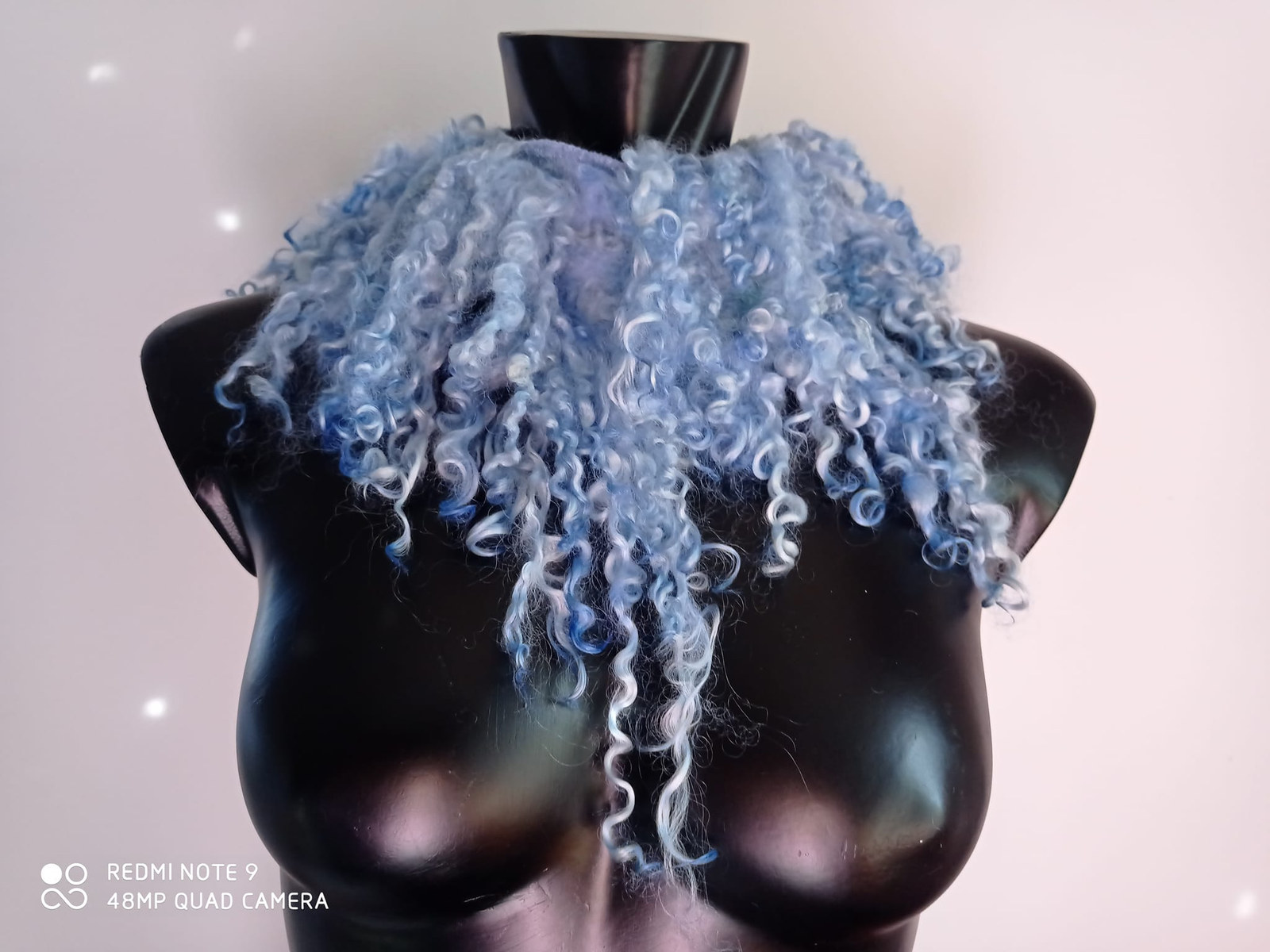 Felted textile wearable art laid flat, by Fiona Whyte